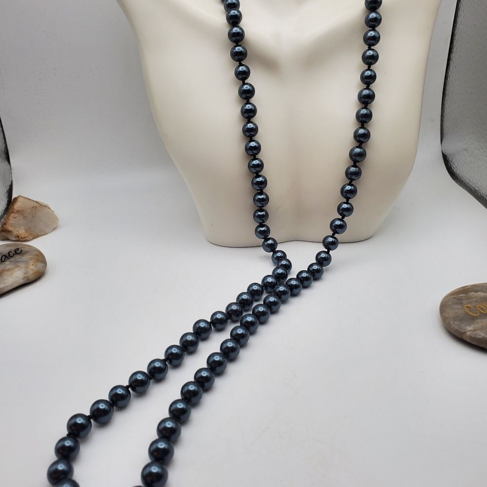 Hand tied brilliant blue black luster beaded necklace